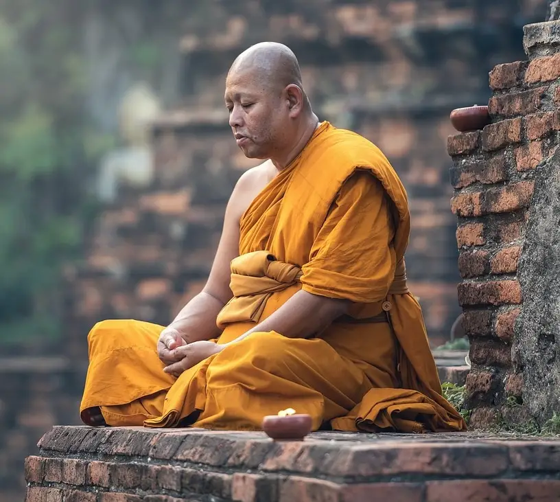 monk demonstrating Breathing meditation